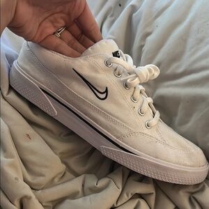 Nike White Low-Top Canvas Sneakers with Black Swoosh